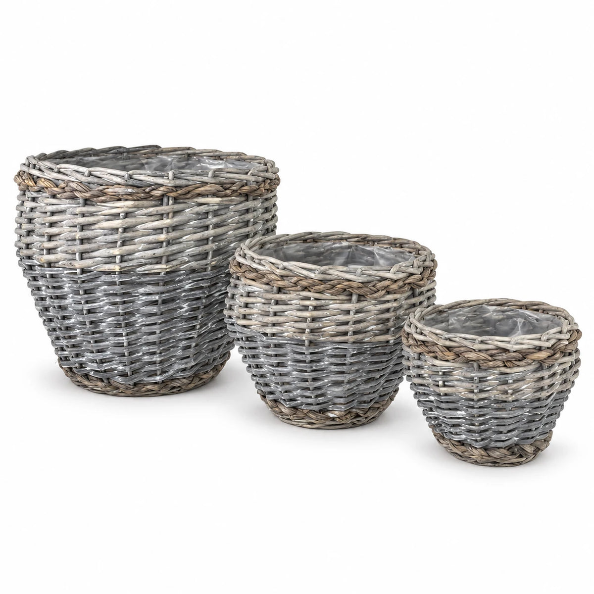 Complete set of three empty graduated Meon planter baskets with liners on white