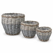 Complete set of three empty graduated Meon planter baskets with liners on white