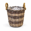 Meon round willow basket with braided side handles and clear liner on white