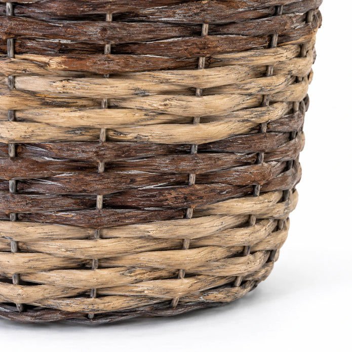Close-up of natural and dark split-willow bands and curved base of Meon round basket