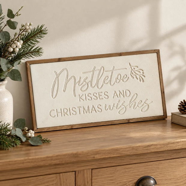 Wood & Metal Sign - White Mistletoe Kisses And Christmas Wishes on an oak console.