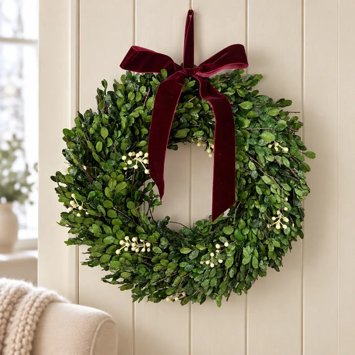 Christmas mistletoe wreath with burgundy bow and greenery, perfect for holiday decor from Satchville.