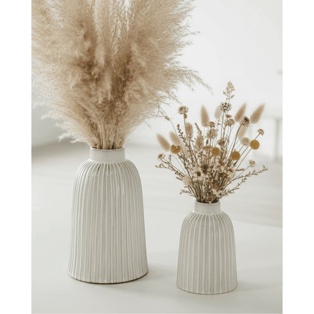 Medium Monte ribbed vase by Hill Interiors, showcasing a textured ceramic design with a neutral finish.
