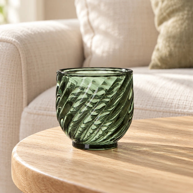 Moss Green Tealight Candle Holder — patterned holder empty on pale oak side table