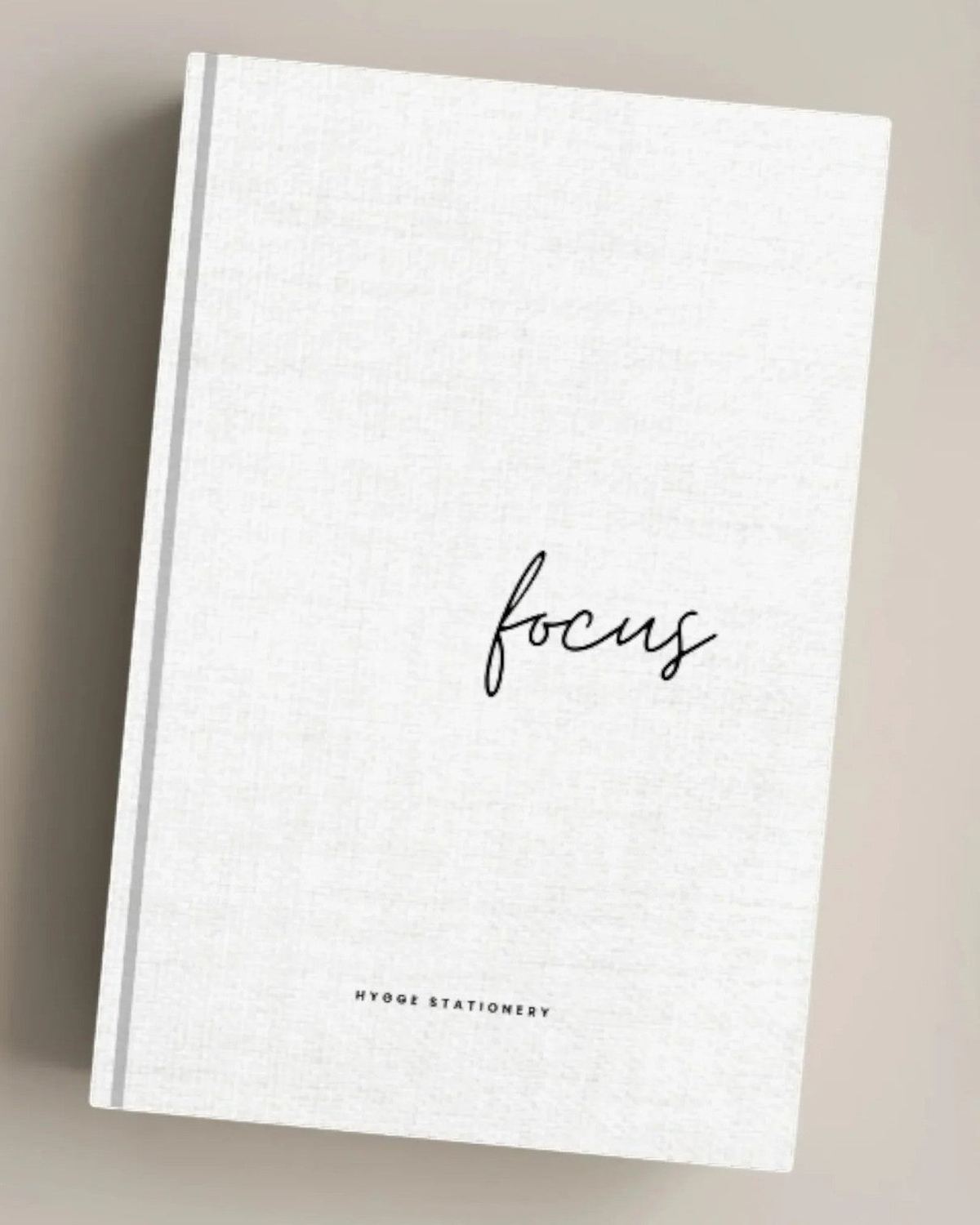 A focused notebook from My Hygge Shop, featuring a clean design suitable for gift-giving and note-taking.