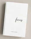 A focused notebook from My Hygge Shop, featuring a clean design suitable for gift-giving and note-taking.
