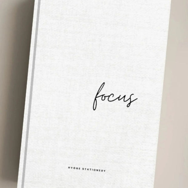 A focused notebook from My Hygge Shop, featuring a clean design suitable for gift-giving and note-taking.