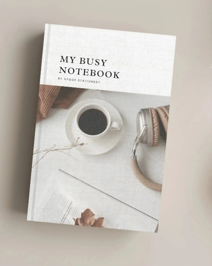 My Busy Notebook by My Hygge Shop, a lined hardcover journal for daily planning and note-taking.