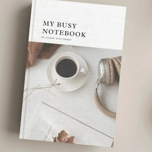 My Busy Notebook by My Hygge Shop, a lined hardcover journal for daily planning and note-taking.