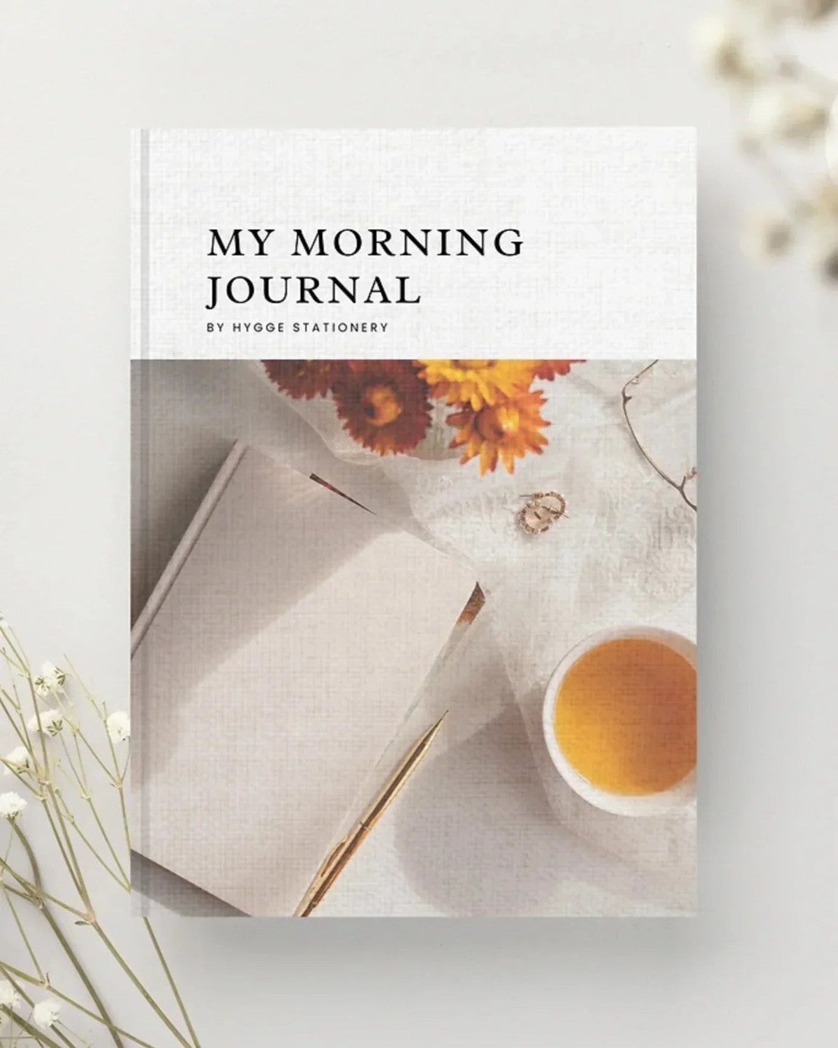 A My Morning Journal notebook from My Hygge Shop with a soft cover, designed for daily journaling and gift-giving.