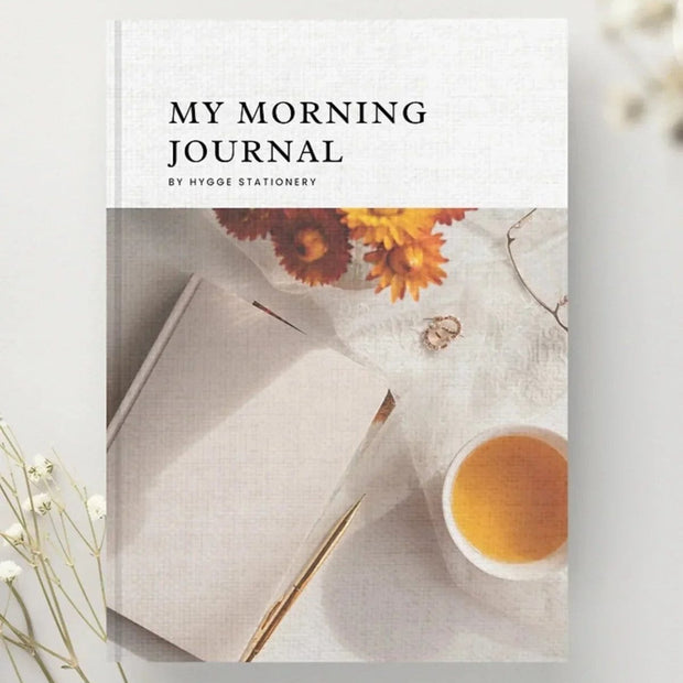 A My Morning Journal notebook from My Hygge Shop with a soft cover, designed for daily journaling and gift-giving.