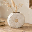 Satchville natural ceramic vase with flower design, featuring dried stems inside, ideal for decorative floral arrangements.