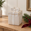 Natural ceramic gift box with bow lid fitted, styled on an oak Christmas console