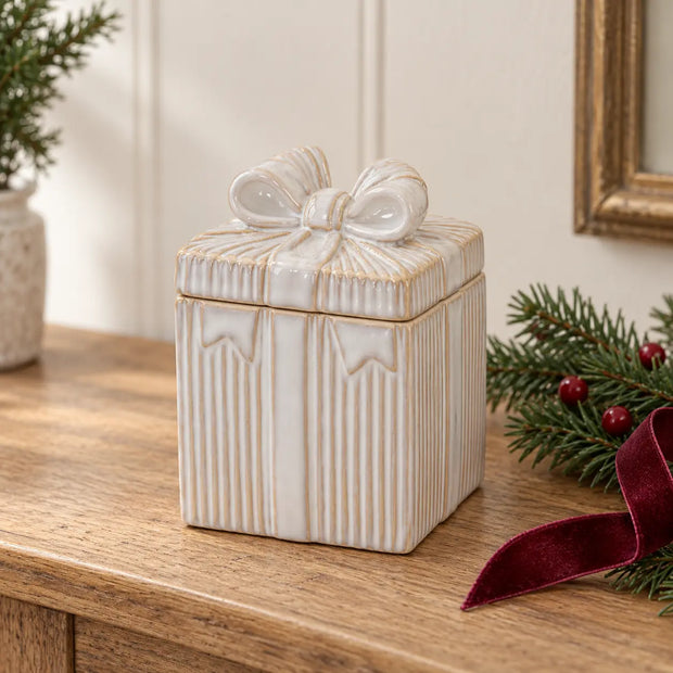 Natural ceramic gift box with bow lid fitted, styled on an oak Christmas console