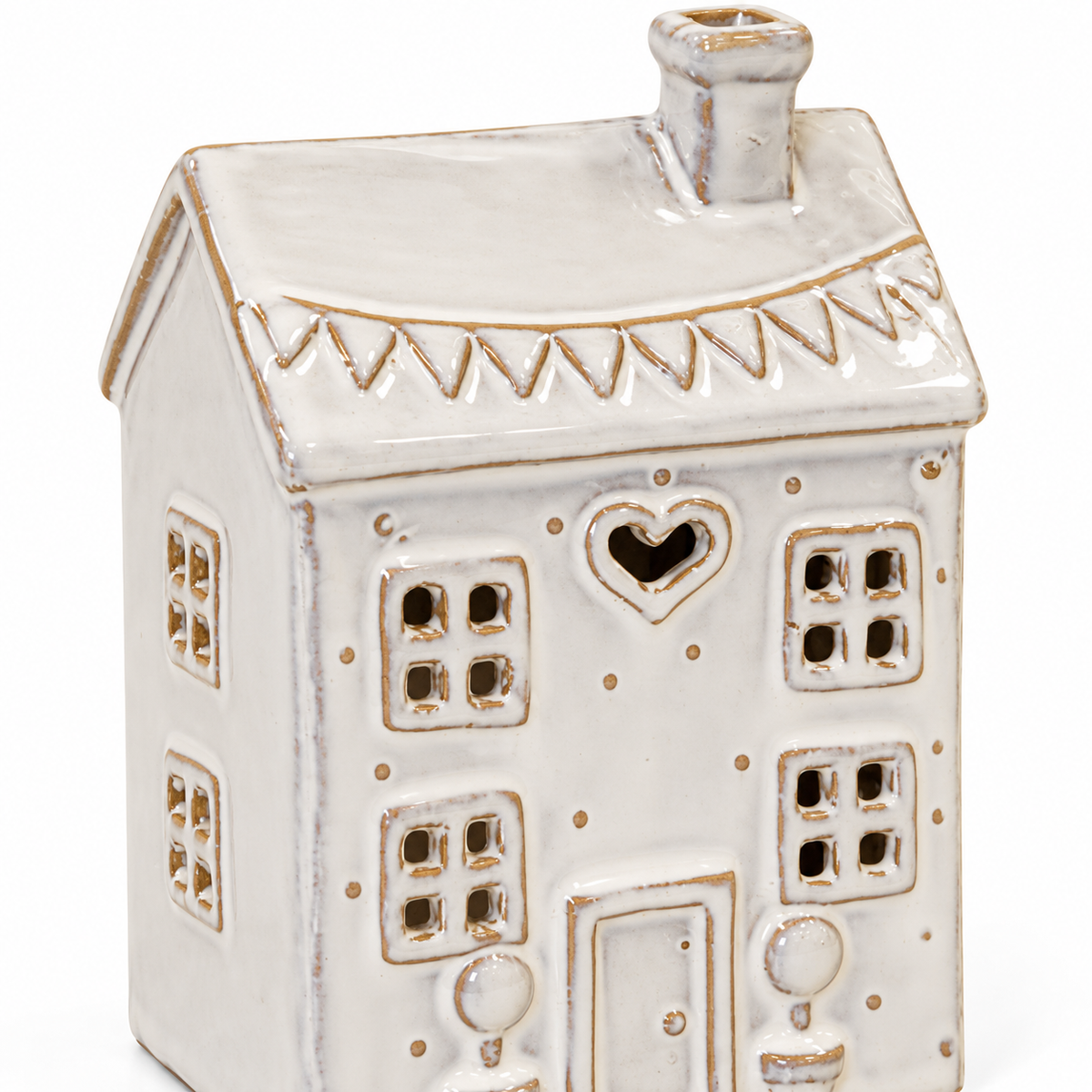 Close-up of the heart opening, windows and glazed roof of the natural ceramic tealight house