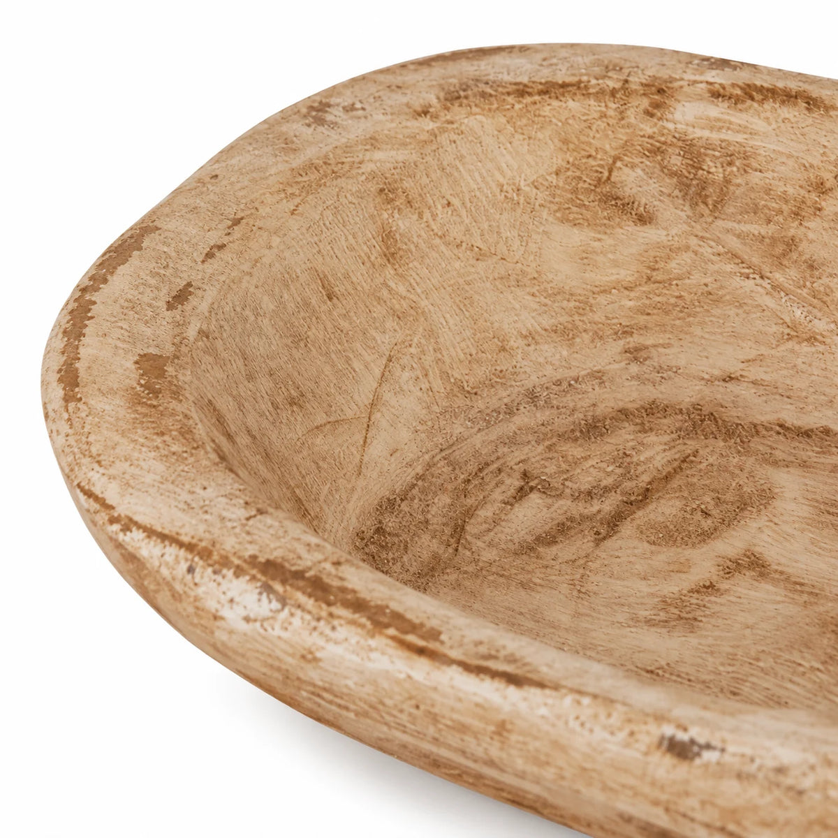 Close-up of the natural pine mini dough bowl’s rounded rim and rough hand-carved wood texture.