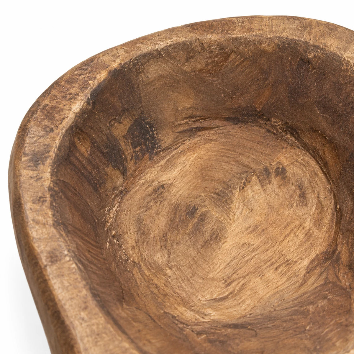 Close-up of the natural walnut mini dough bowl’s uneven rim, showing coarse grain and hand-carved texture.