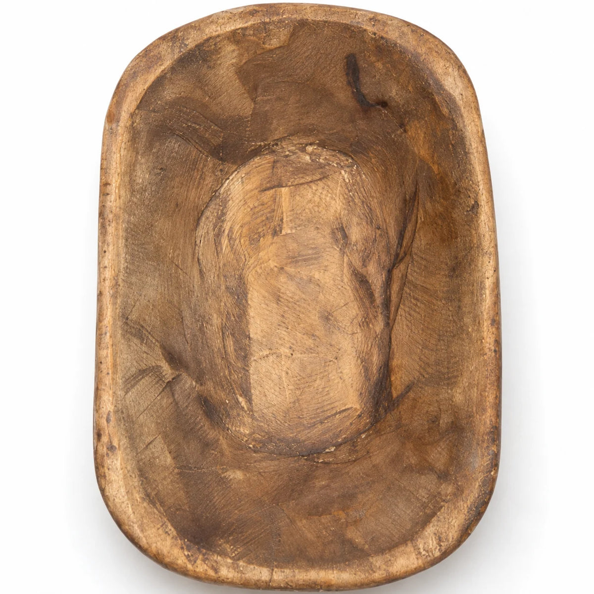 Close-up of the natural walnut mini dough bowl’s lighter inner centre and surrounding wood grain.