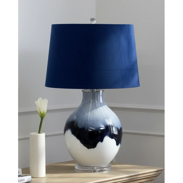 Navy blue glass lamp with deep blue linen shade, decorative lighting by Hill Interiors, 68cm tall.