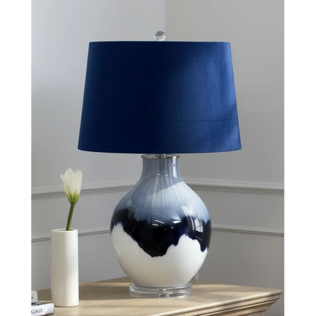 Navy blue glass lamp with deep blue linen shade, decorative lighting by Hill Interiors, 68cm tall.