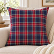 Navy and red tartan cushion cover styled on an oatmeal sofa, inner not included