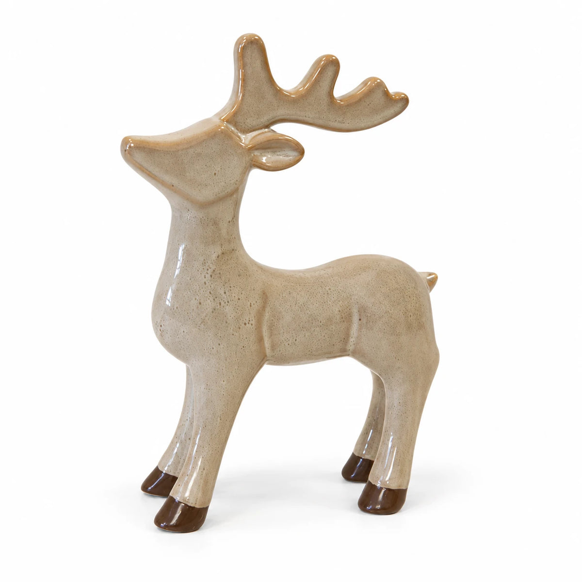 Neutral standing reindeer ornament in fawn glazed ceramic on a white studio background.