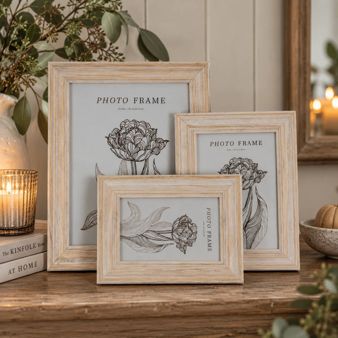 Neutral Wooden Isla photo frames with pale whitewashed stepped borders styled on rustic country console; sizes shown for styling