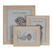 Original supplier studio photograph showing the Isla photo frame collection with stepped pale wood borders