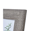 Neutral wooden photo frame with woven border from Hill Interiors, showcasing a stylish and rustic decor accent.