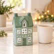 Satchville Nordic green ceramic tealight holder house, small Christmas decoration styled in a kitchen
