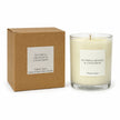 Heaven Scent Nutmeg, Orange + Cinnamon Medium Candle, unlit with its brown kraft box against white