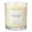 Heaven Scent Nutmeg, Orange + Cinnamon Medium Candle, close-up of the fragrance label and clear glass