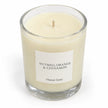 Heaven Scent Nutmeg, Orange + Cinnamon Medium Candle, close-up of cream wax and the unlit wick