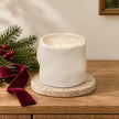 Off-white Satchville sculpted candle, elegant home decor piece with intricate detailing, ideal for festive or cozy settings.
