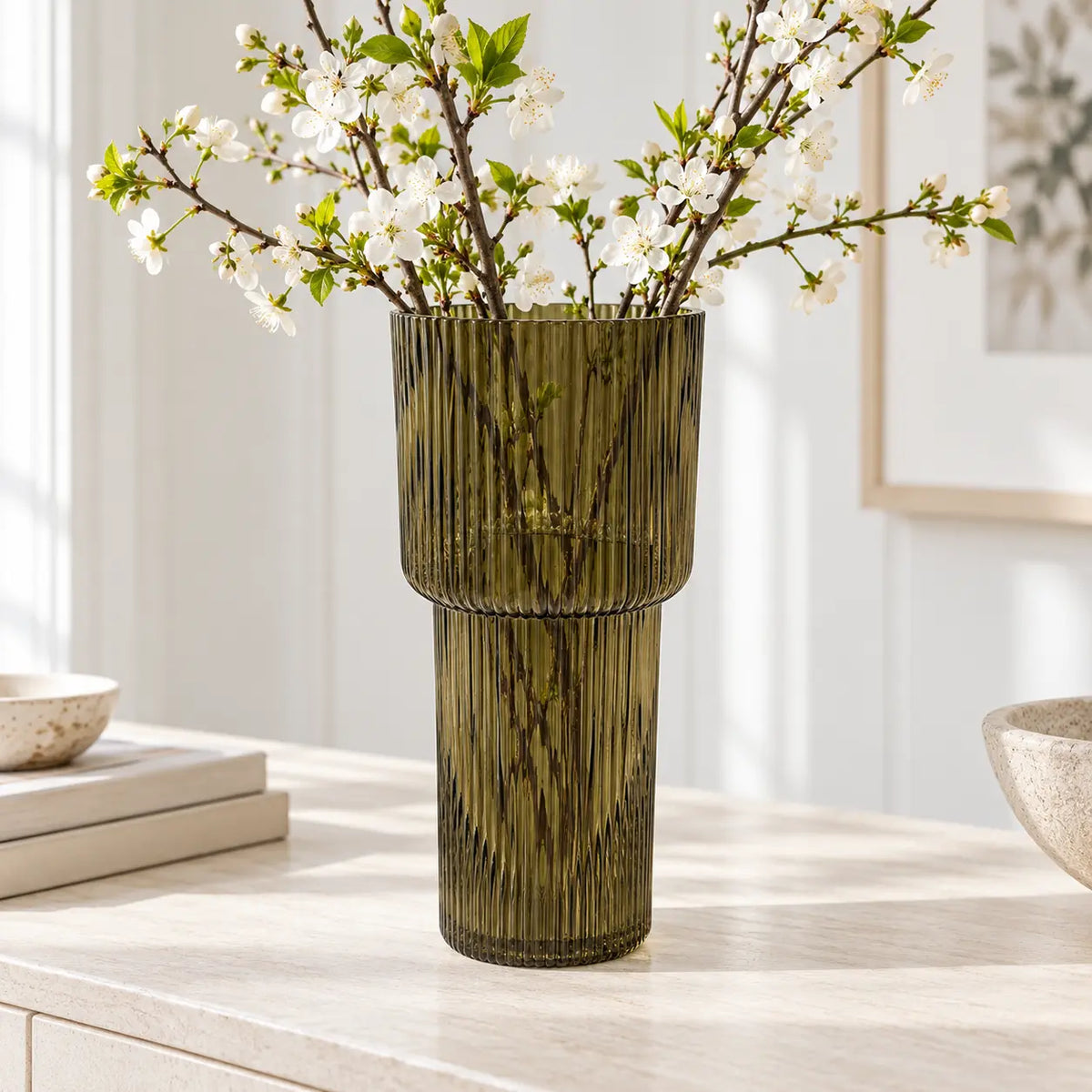 Satchville olive green tall glass ribbed vase with blossom stems