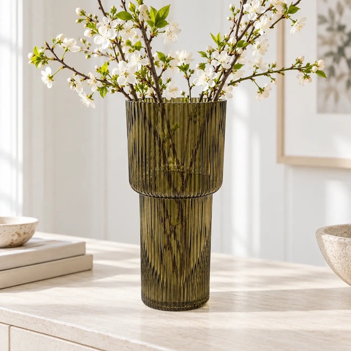 Satchville olive green tall glass ribbed vase with blossom stems