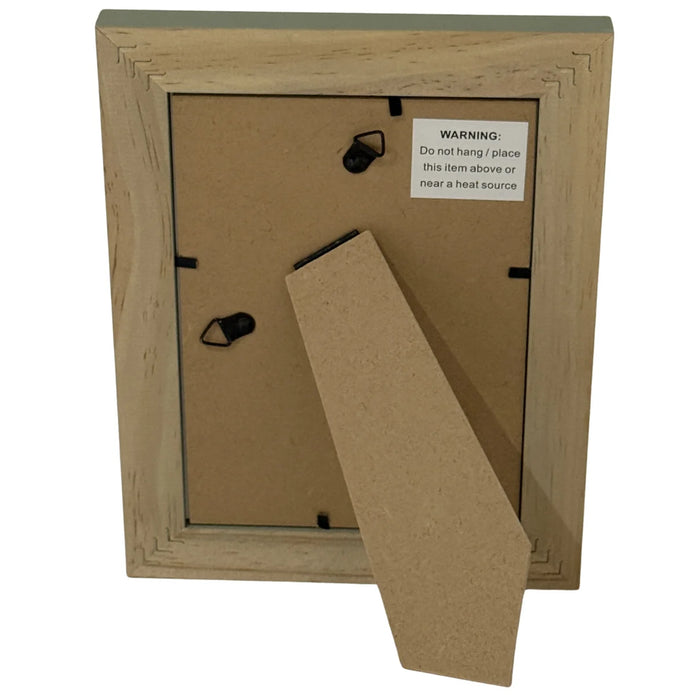 Rear of Vilde wooden photo frame showing tabletop stand and hanging fittings