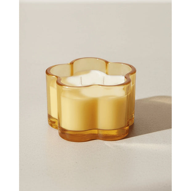 Orange glass flower scented candle by Gisela Graham, spring-themed candle with floral design and warm orange color.