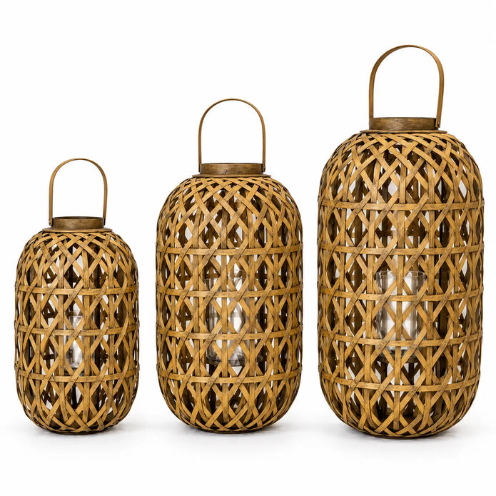 Three sizes of oval bamboo lantern shown with glass inserts and candle styling on white; each lantern sold individually