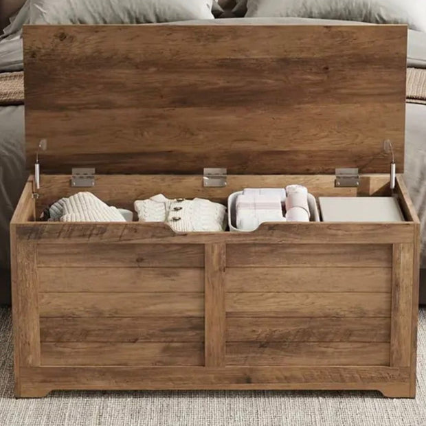 Wooden storage trunk from Starlight Express, a versatile furniture piece with a natural wood finish and spacious interior.