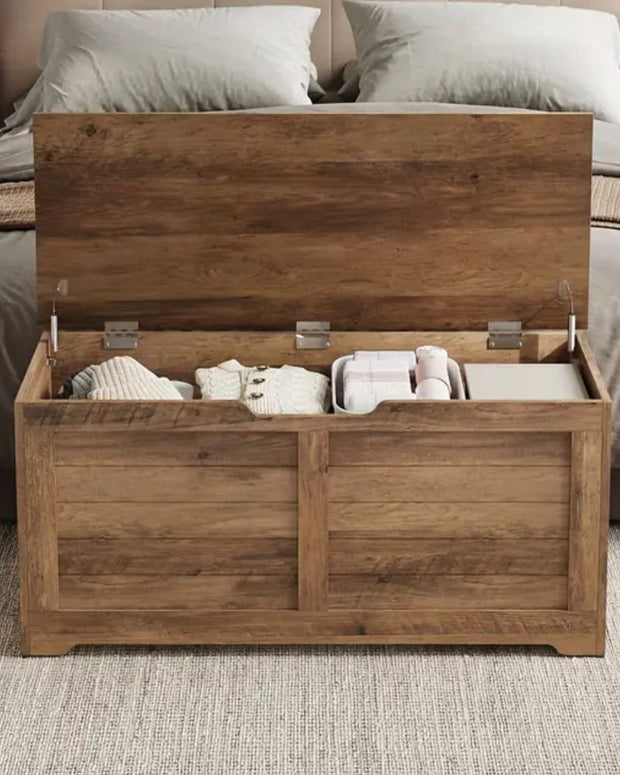 Wooden storage trunk from Starlight Express, a versatile furniture piece with a natural wood finish and spacious interior.