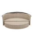 Natural rattan day bed from Pacific Lifestyle Ltd, part of a garden furniture set with cushions in an outdoor setting.