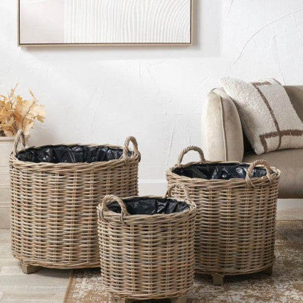 Round rattan Kubu storage baskets with luxury lining, ideal for home decor, by Pacific Lifestyle Ltd.