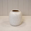 Small cream ceramic ribbed vase by Satchville, featuring a textured ribbed surface for elegant home decor.
