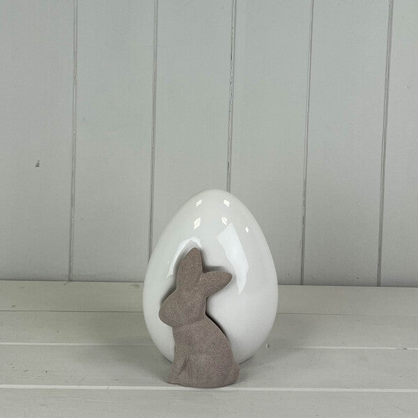 Large ceramic white egg with rabbit decoration for spring by Satchville, detailed and festive for seasonal decor.