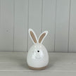 Small ceramic white rabbit figurine by Satchville, perfect for spring decor, featuring a detailed bunny design.