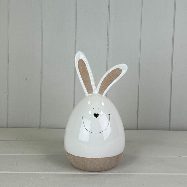 Large white ceramic rabbit sculpture by Satchville, perfect for spring decor, featuring a smooth, glossy finish and detailed design.