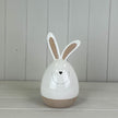 Large white ceramic rabbit sculpture by Satchville, perfect for spring decor, featuring a smooth, glossy finish and detailed design.