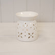 Large white ceramic oil burner with glazed finish and flower petal design by Satchville, featuring a decorative flower pattern.