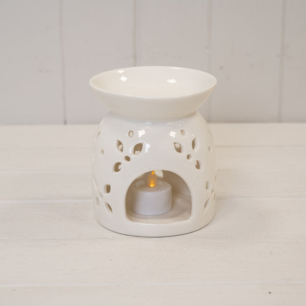 Large white ceramic oil burner with glazed finish and flower petal design, perfect for aromatic oil diffusing.